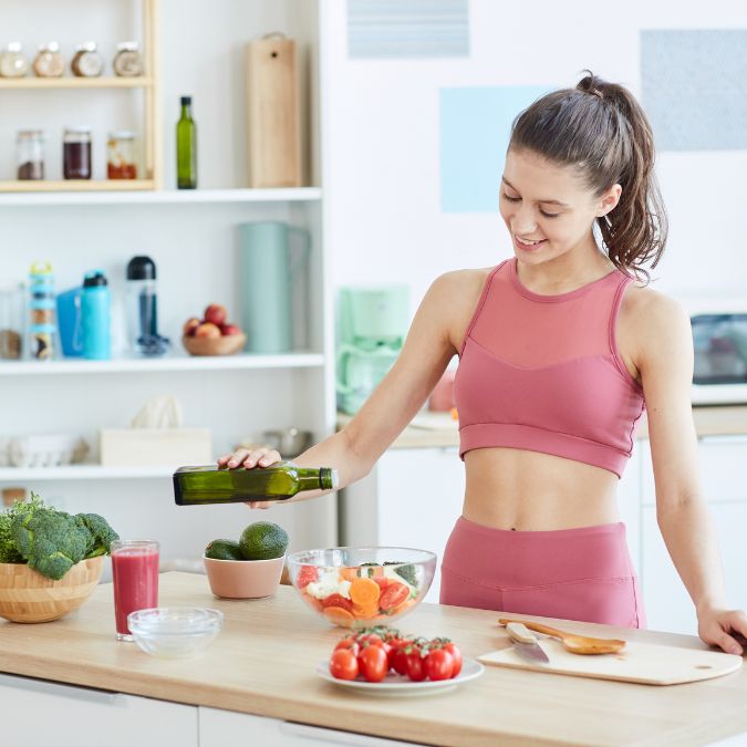 healthy woman preparing healthy meal